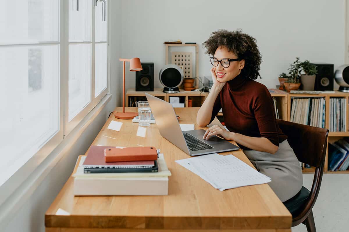 Employee works in home office on laptop